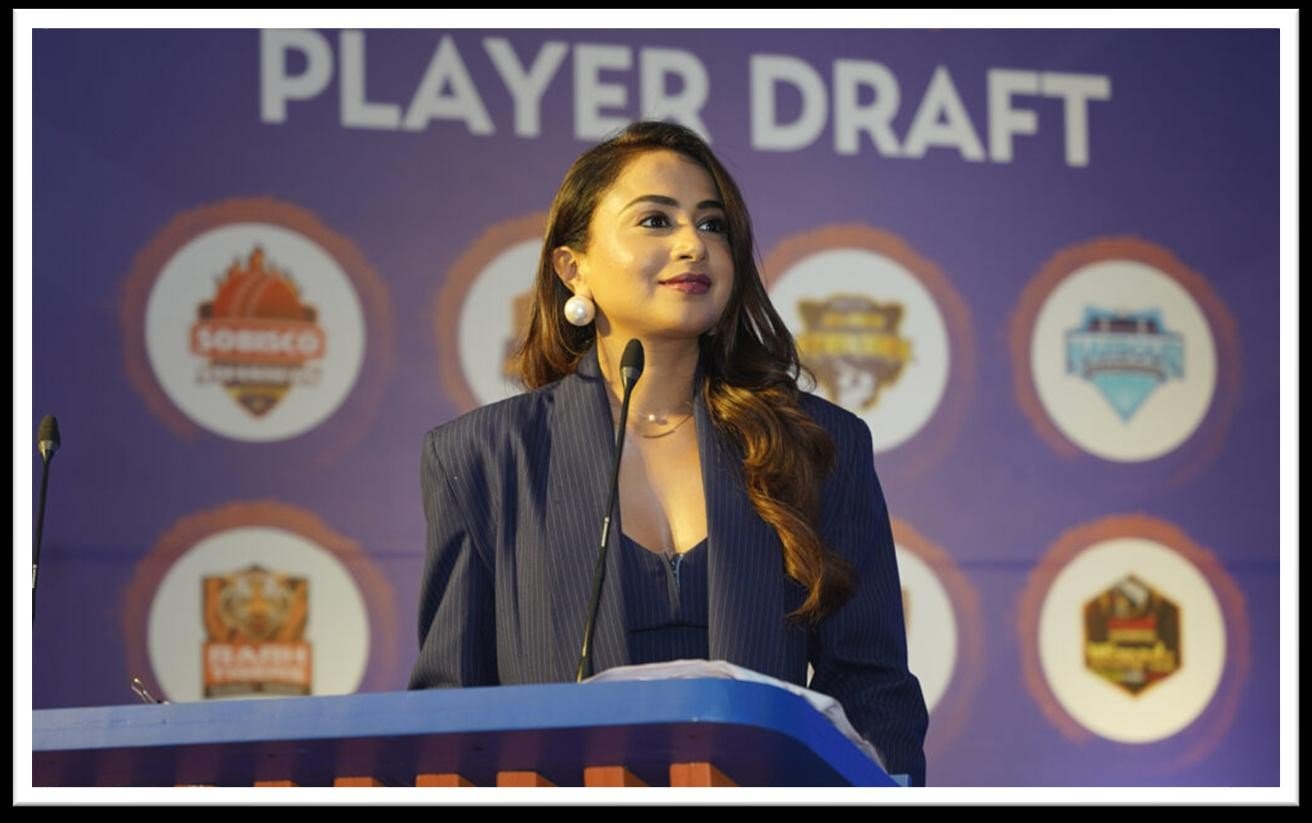 The host at the Player Draft podium