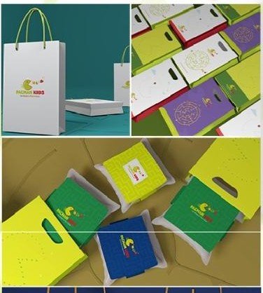 PacMan Kiids packaging: a white carrier bag and colourful boxes