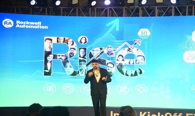 A speaker on the Rise keynote stage